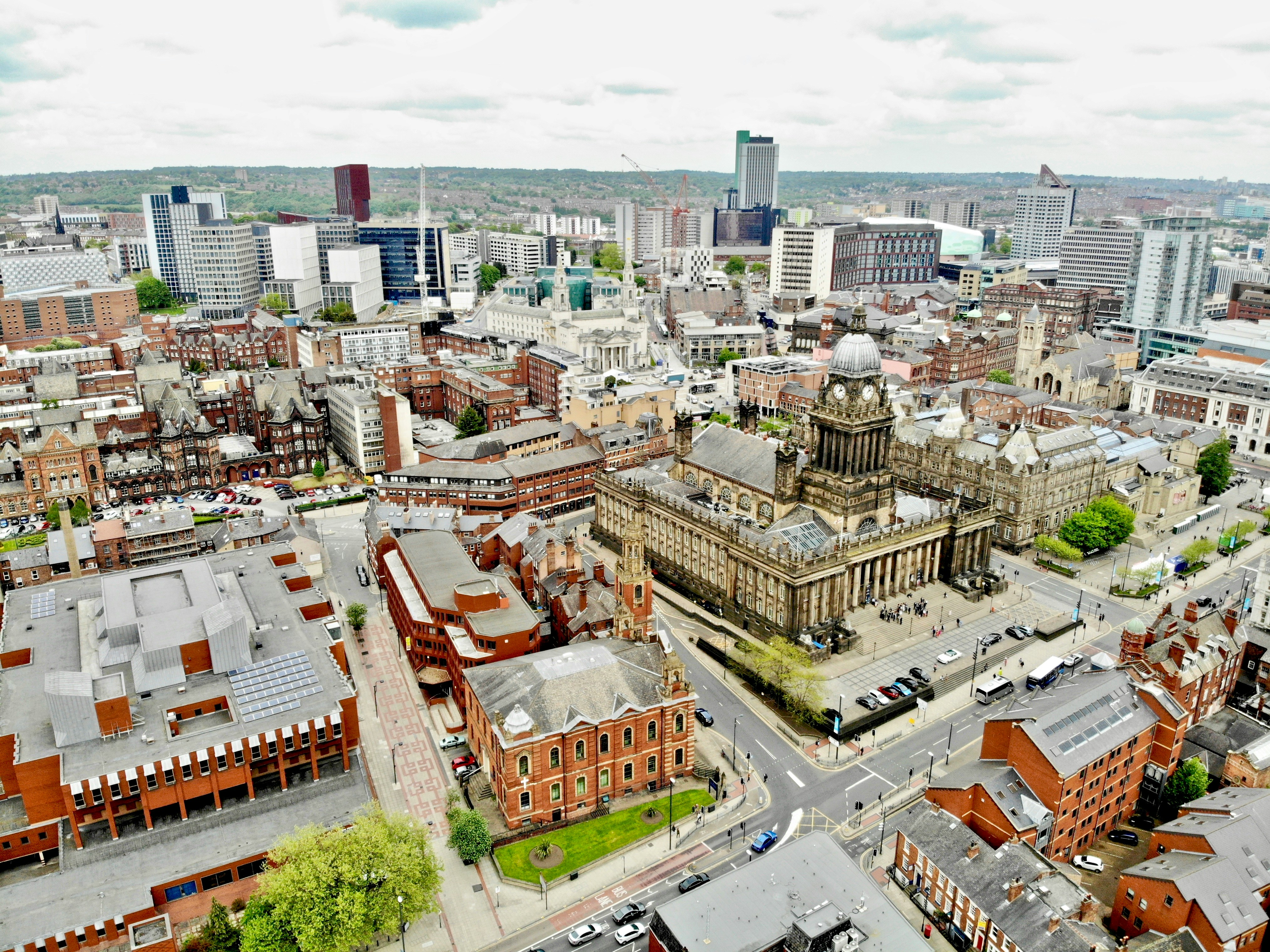 Aerial view of Leeds city centre showing Leeds Town Hall and the surrounding regeneration area