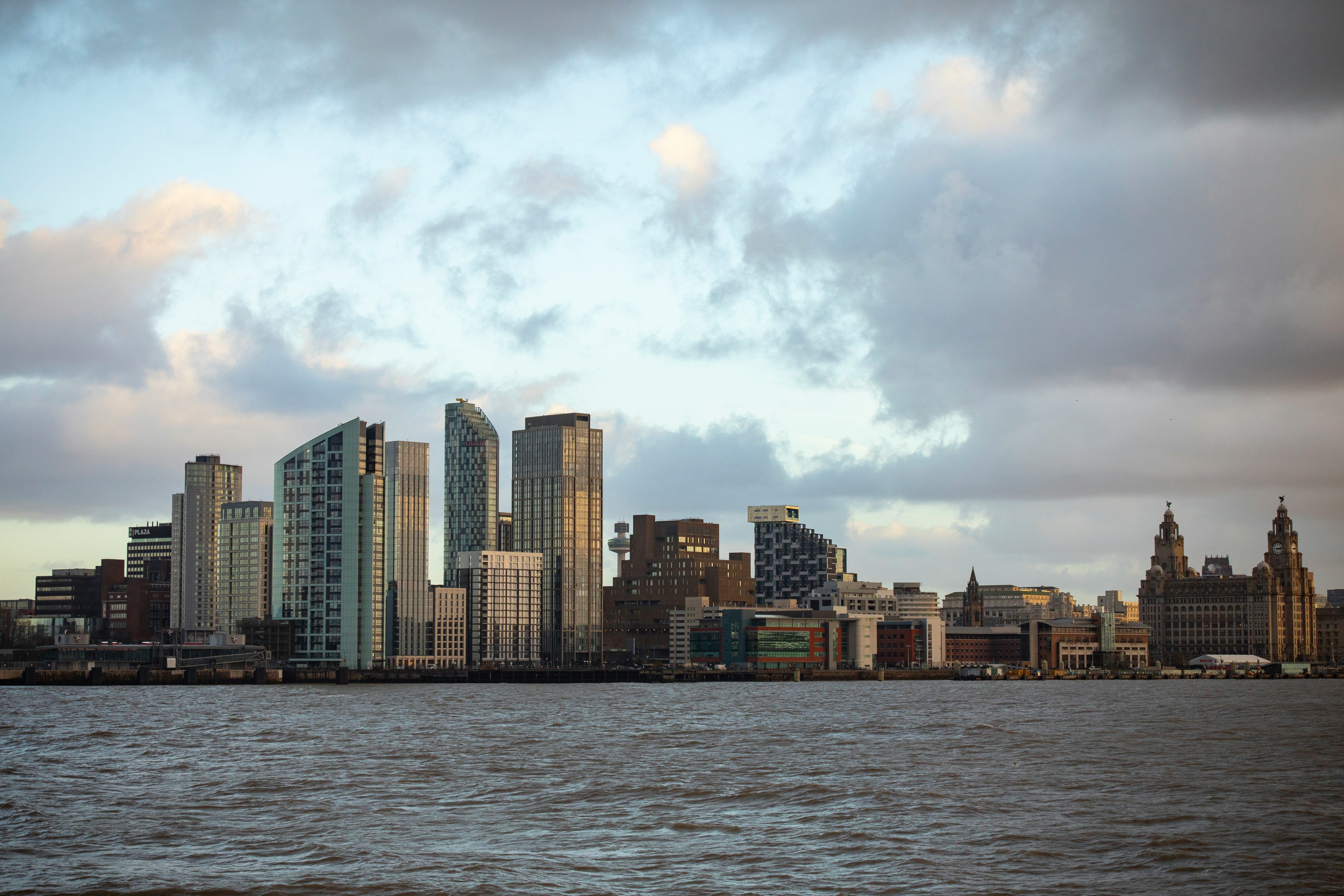 Liverpool waterfront skyline viewed across the River Mersey, including the Royal Liver Building